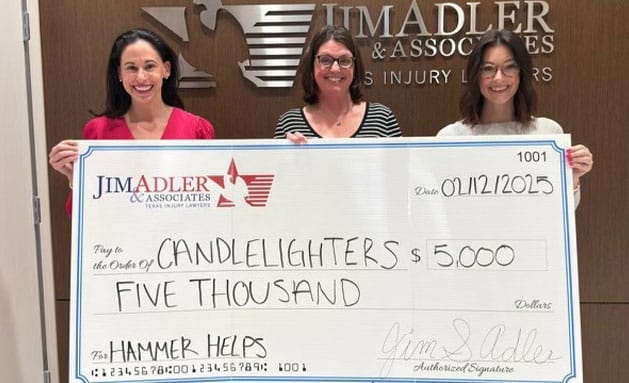 image of Candlelighters Houston receiving $5k check from Jim Adler & Associates - Houston