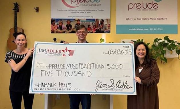 image of Prelude Music Foundation receiving $5k check from Jim Adler & Associates