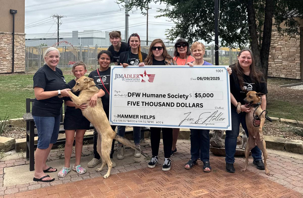 DFW Humane Society Receiving Check from Jim Adler & Associates